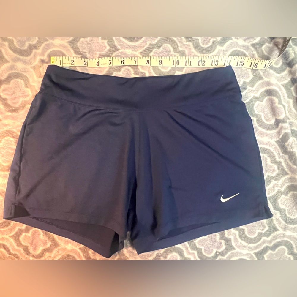 Nike navy blue athletic shorts w slits at sides and lots of stretch sz M